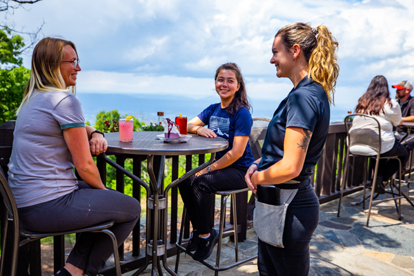 Outdoor dining on the terrace at Big Meadows Lodge